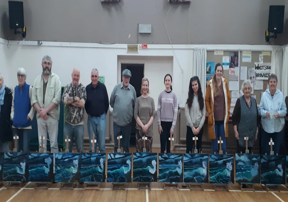 Painting class for adults: finished seascapes Adult painting class group with their finished seascape oil paintings in Whitstable
