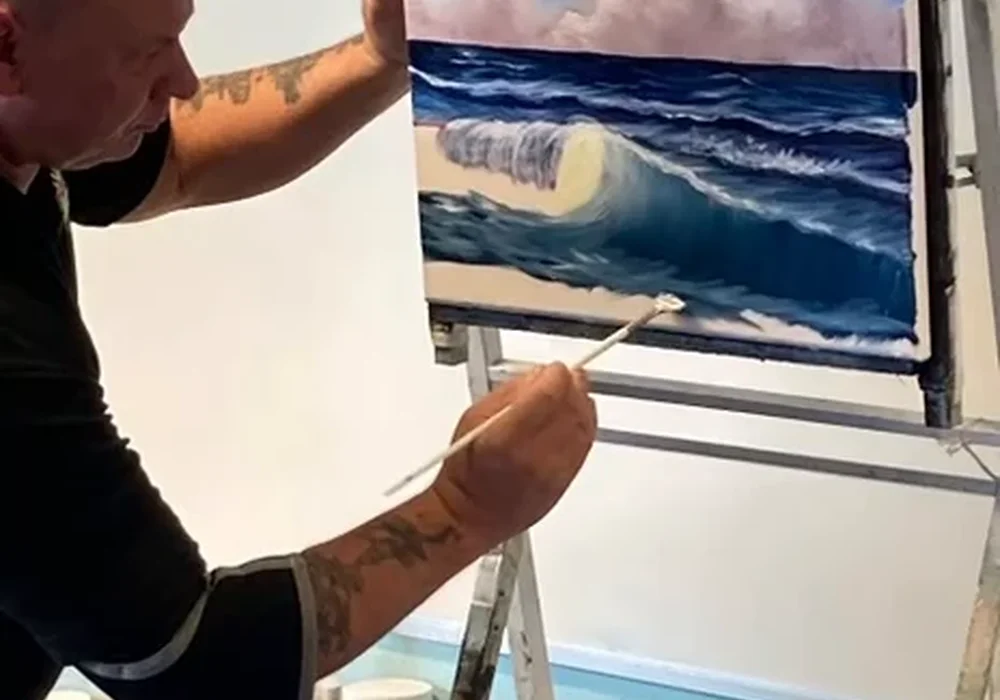 Mark Terrell painting a Bob Ross ocean wave seascape during an oil painting class in Kent