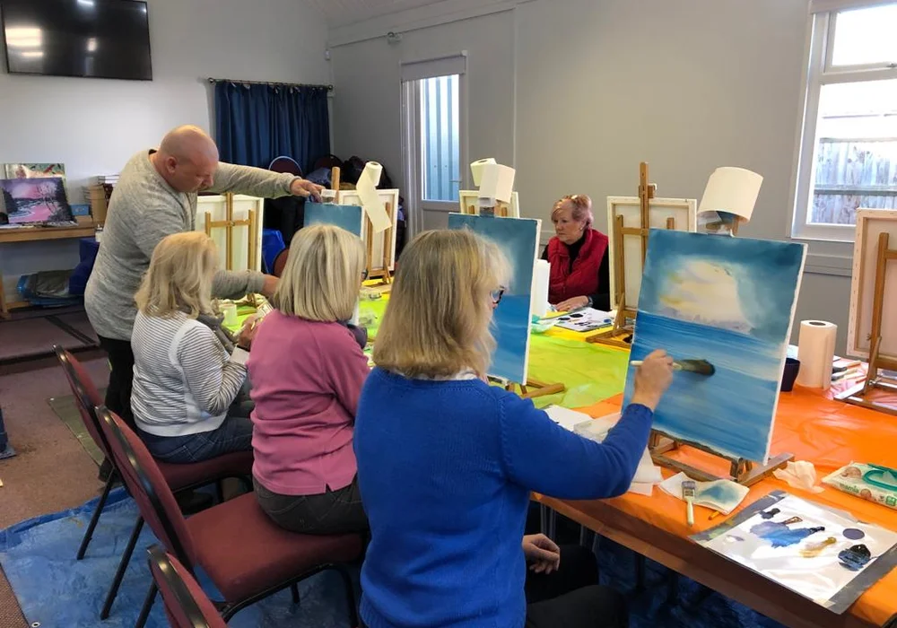 Beginner painting class: painting the sky Mark Terrell teaching adult beginners to paint a Bob Ross sky