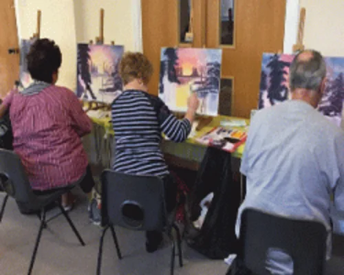 Wet-on-wet landscape painting workshop for West Sussex students Wet-on-wet landscape painting students in a Bob Ross workshop